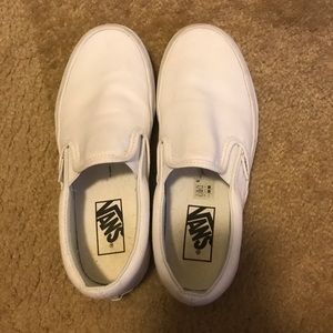 All white slip on vans. Men’s-5. Womens-6.5.